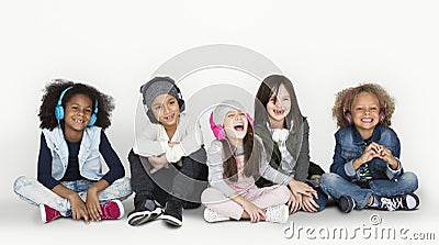 Group of Children Studio Smiling Wearing Headphones and Winter C Stock Photo