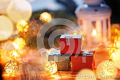 Group Christmas gift boxes and lights. New year presents. Stock Photo