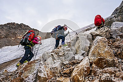 Group of climbers ascent to the mountain during a sporting hike Editorial Stock Photo