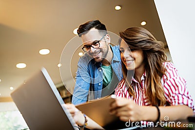 Group of college students studying in the school library. Stock Photo