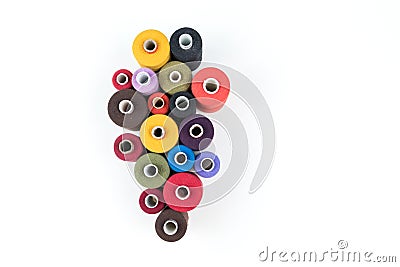 Group of colored thread coils on white background, sewing and tailoring Stock Photo