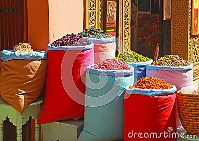 Group colorful bags with dried fruits and spices on maroccan oriental arabian market souk - Marrakech, Morocco Stock Photo