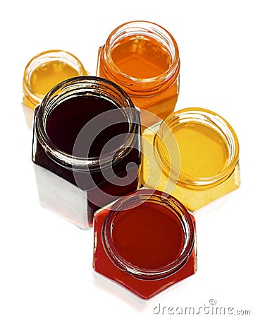Group of colorful hexagonal jars Stock Photo