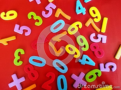 A group of colourful plastic numbers for numeration learning. Education and fun learning concept Stock Photo