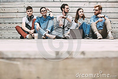 Group of confident people sitting and discuss Stock Photo