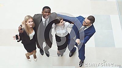 Group confident positive business people celebrate the victory. Stock Photo