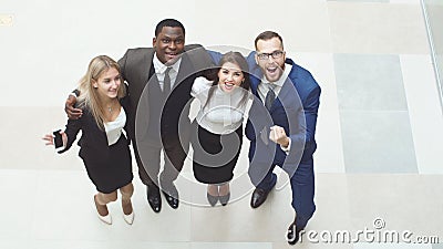 Group confident positive business people celebrate the victory. Stock Photo