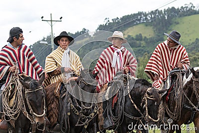 Group of cowboys wearing traditional ponchos Editorial Stock Photo