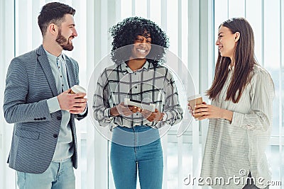 Group of coworkers having a coffee break Stock Photo