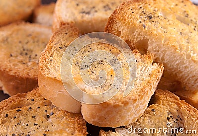 Group of crispy toasted croutons with black salt Stock Photo