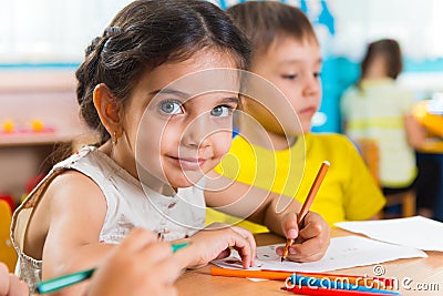 Group of cute little prescool kids drawing Stock Photo