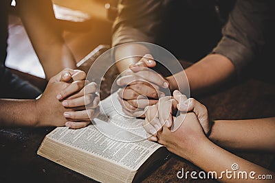 Group of different women praying together Stock Photo