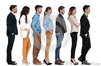 Group of different young people waiting in line Stock Photo