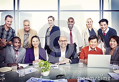 Group of Diverse Business People in a Board Room Stock Photo