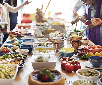 Group of diverse people are having lunch together Stock Photo