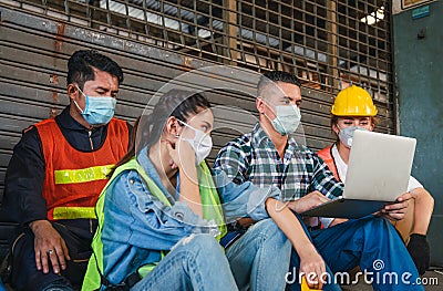 Group of diverse workers wearing face mask failure following news layoffs workers due to COVID-19 pandemic Stock Photo