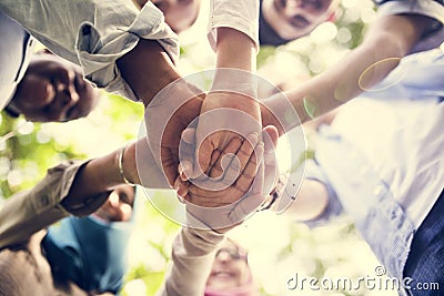 Group of diverse youth hands joined Stock Photo