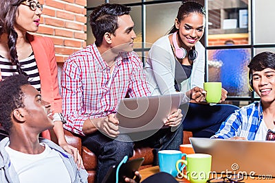 Group of diversity college students learning on campus Stock Photo