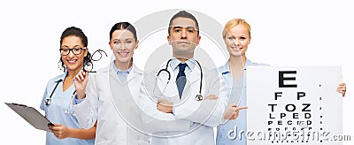Group of doctors with eye chart and glasses Stock Photo