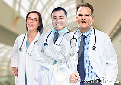Group of Doctors or Nurses Inside Hospital Building Stock Photo