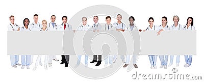 Group of doctors with placard Stock Photo