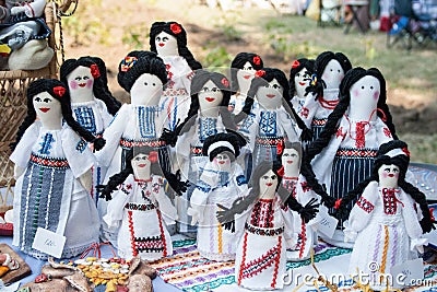 Group of doll women and girls in traditional Moldovan clothes Stock Photo