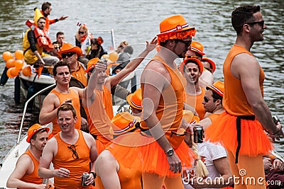 Group dressed like womans at Koninginnedag 2013 Editorial Stock Photo