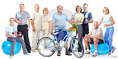 Group of elderly fitness people with bicycle. Stock Photo