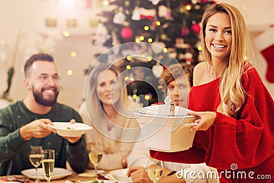 Group of family and friends celebrating Christmas dinner Stock Photo