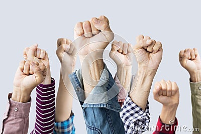 Group of fists raised in air Stock Photo