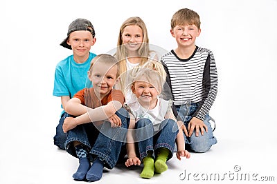 The group of five children siting on the floor Stock Photo