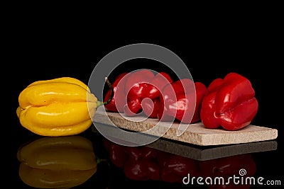 Hot chili habanero isolated on black glass Stock Photo