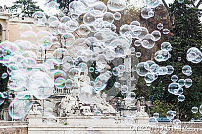 Soap bubbles in piazza del Popolo in Rome Stock Photo