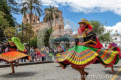 A group of folk dancers from Cayambe, Ecuador, in historical center of Cuenca Editorial Stock Photo