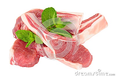 Raw Lamb Cutlets With Mint Leaf Garnish Stock Photo