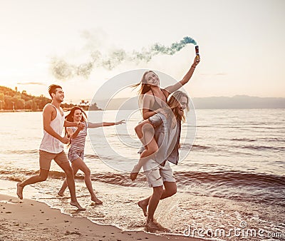 Group of friends on beach Stock Photo