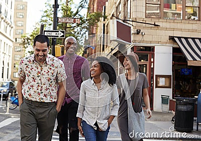 Group Of Friends Crossing Urban Street In New York City Stock Photo