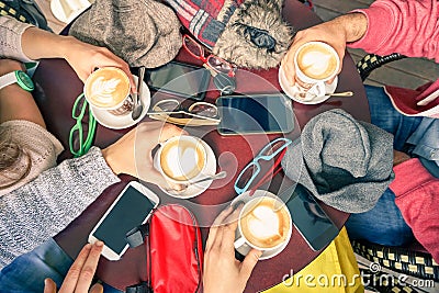 Group of friends drinking cappuccino at coffee bar restaurants Stock Photo