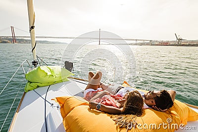 Group of friends having fun in boat in river Stock Photo