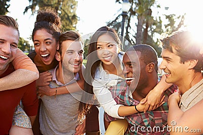 Group Of Friends Having Fun Together Outdoors Stock Photo