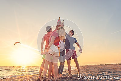 Group of friends enjoy on the beach Stock Photo