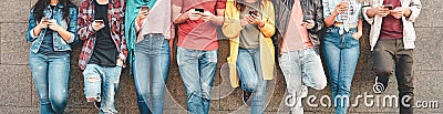 Group of friends using their smart mobile smartphones outdoor - Millennial young people addicted to new technology trends apps Stock Photo