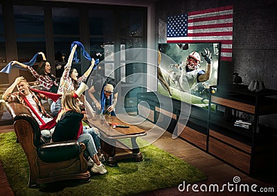 Group of friends watching TV, american football championship Stock Photo