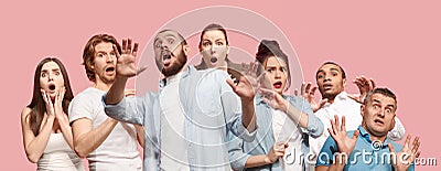 Group of frightened people, woman and man stressful keeping hands on head, terrified in panic, shouting Stock Photo