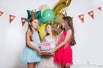 Group of funny kids celebrate birthday party together Stock Photo