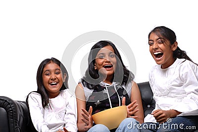 Group of Girls watching TV Stock Photo