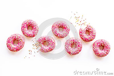 Group of glazed pink donutes. Sweet bakery background Stock Photo