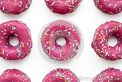 Group of glazed pink donuts on a blue background Stock Photo