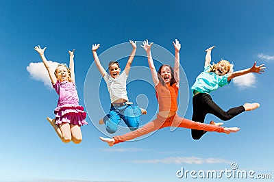 Happy active children jumping Stock Photo