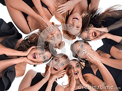 Group of happy amazed women. Surprized and looking down. Bottom view Stock Photo